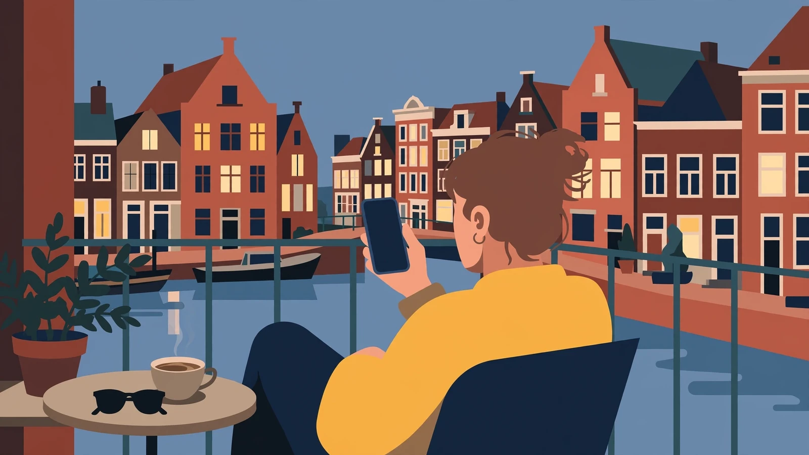 persoon op een balkon met een smartphone in de avond